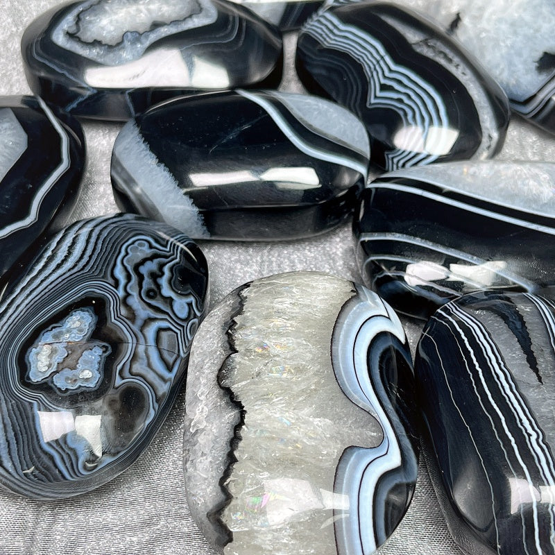 Natural black wrapped agate rolling stone Heal ing Gemstone Home Decor