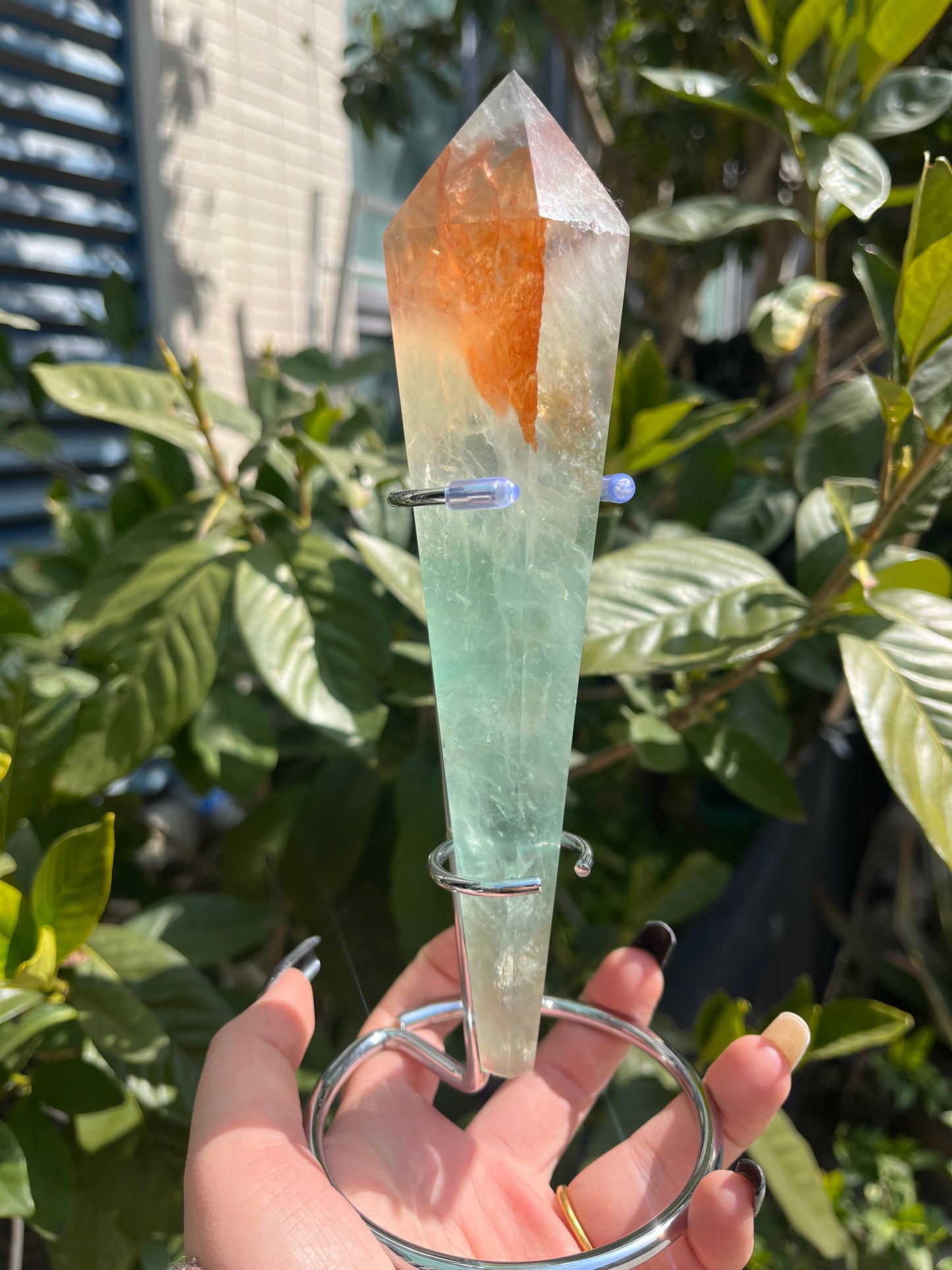 green fluorite with fire quartz wand