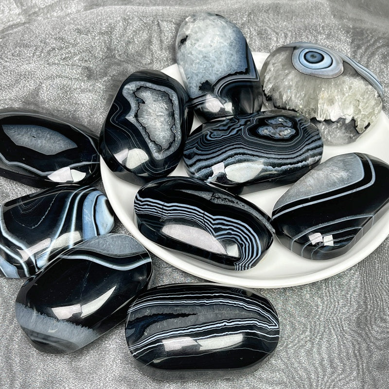 Natural  black wrapped agate rolling stone Heal ing Gemstone Home Decor