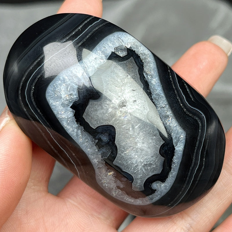 Natural  black wrapped agate rolling stone Heal ing Gemstone Home Decor