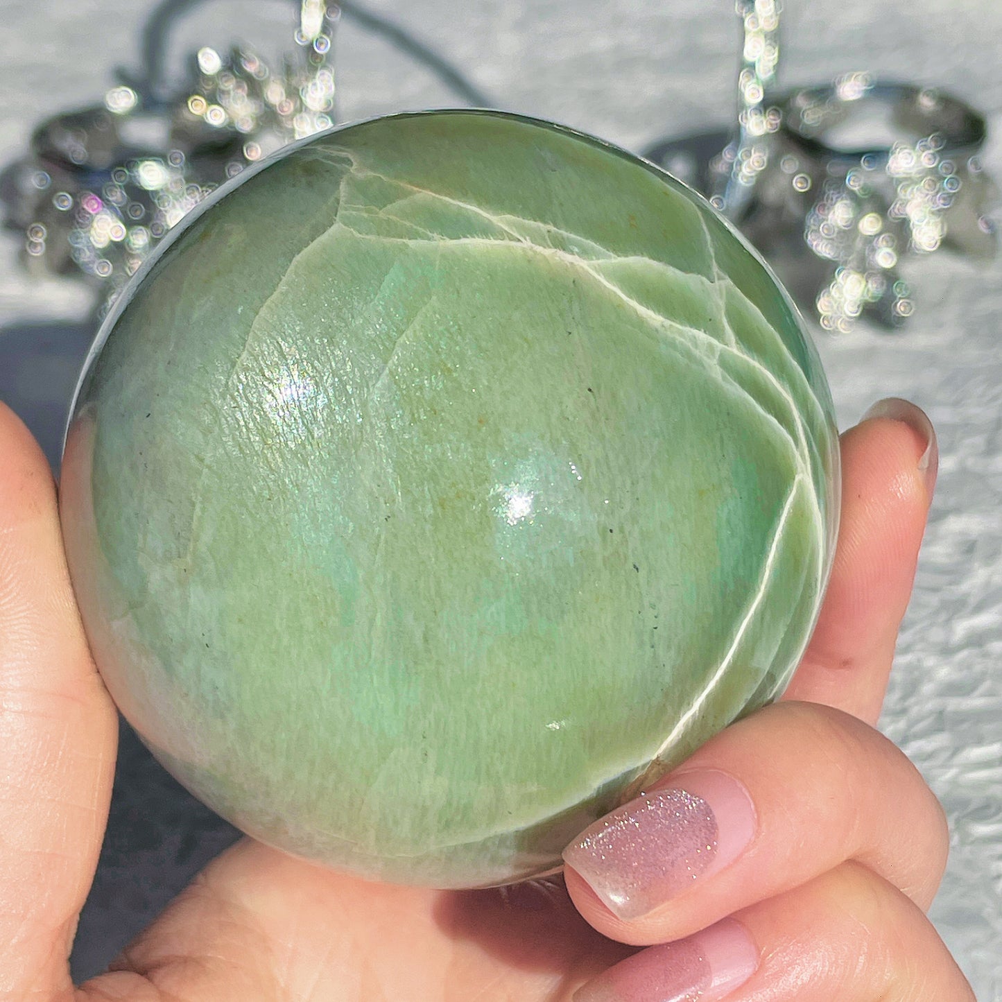 green moon stone sphere