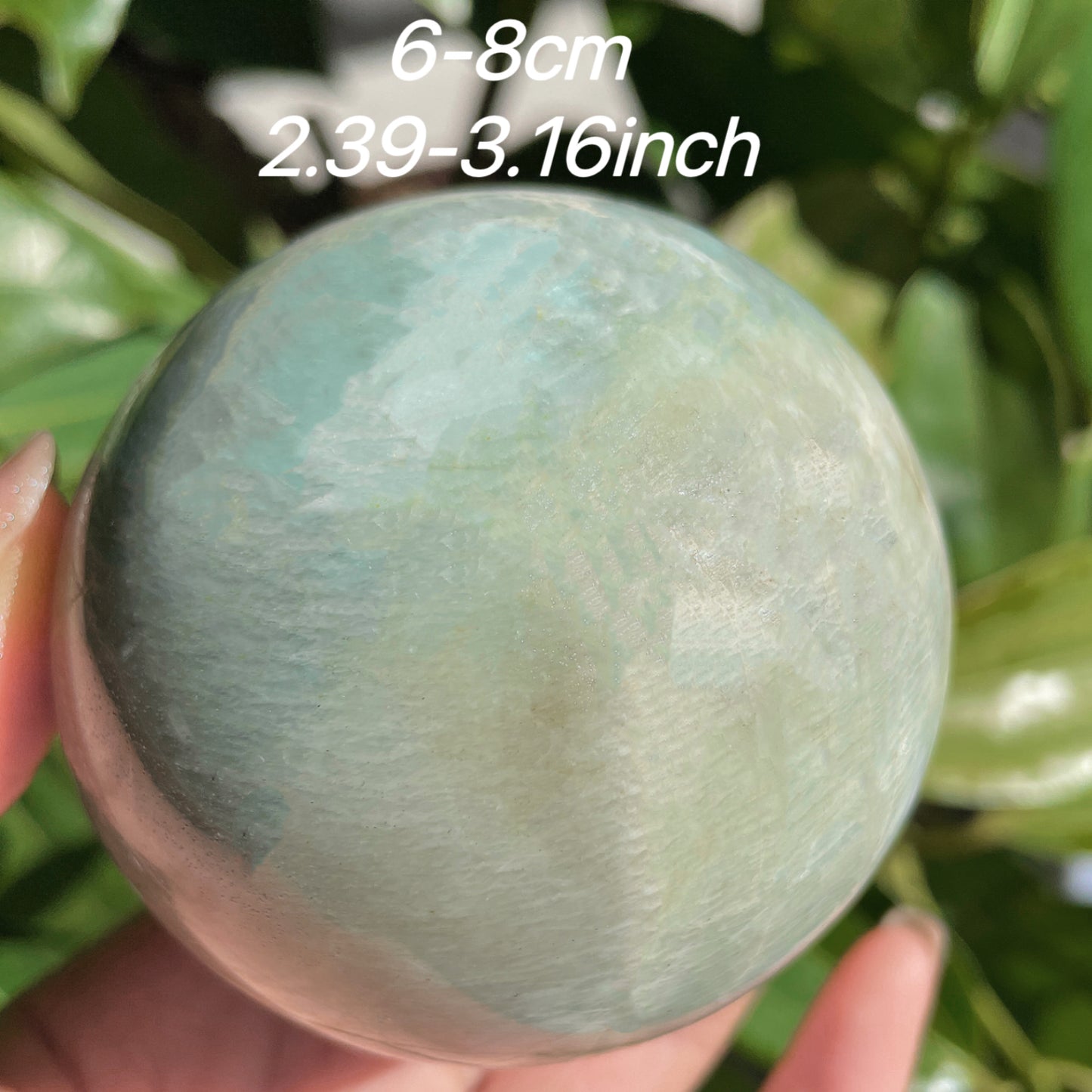 green moon stone sphere